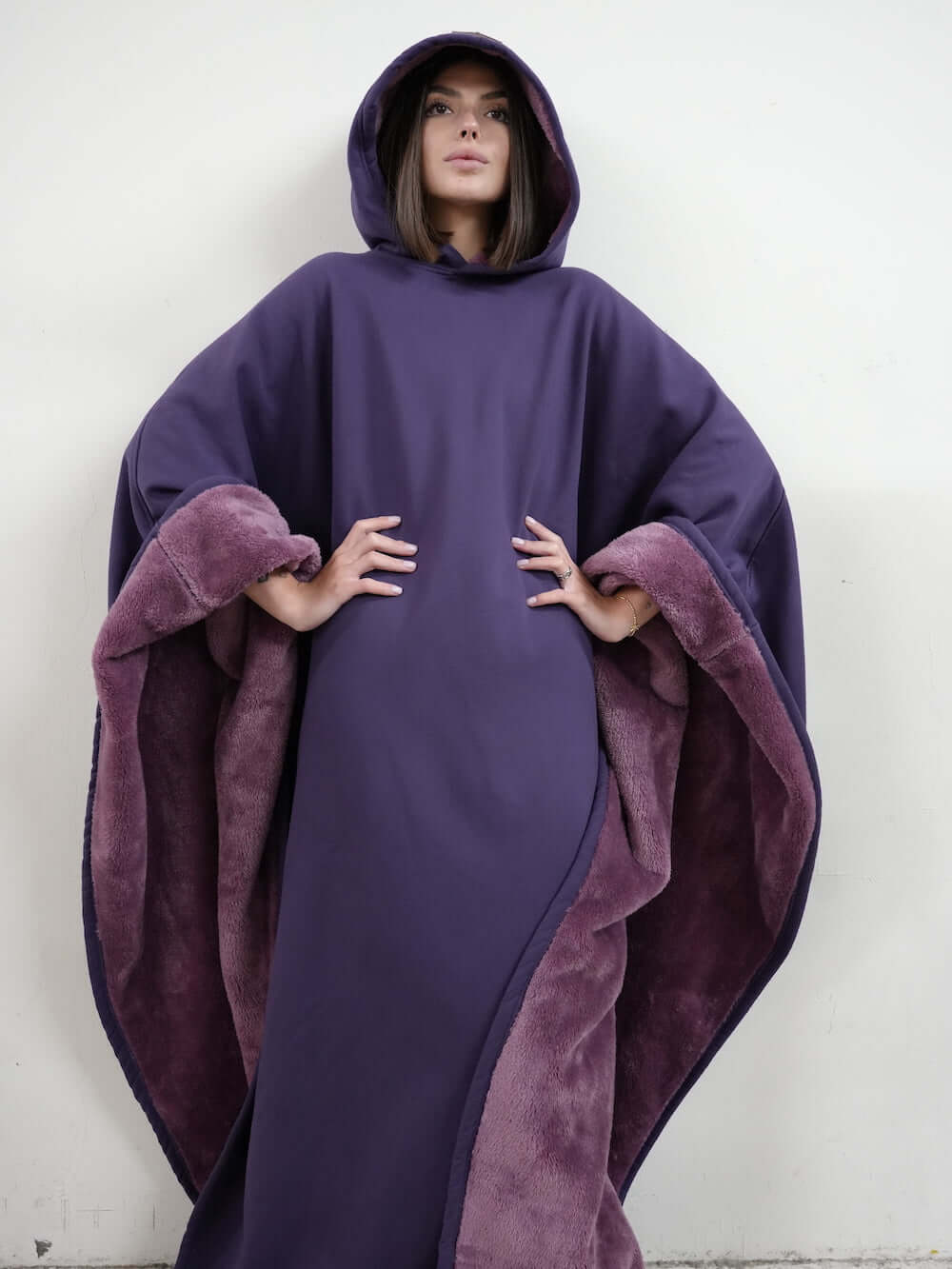 Eden Comfort Hoodie Blanket in purple, designed for ultimate relaxation and gentle pressure to reduce stress.